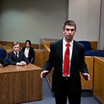 Students hold a mock trial.